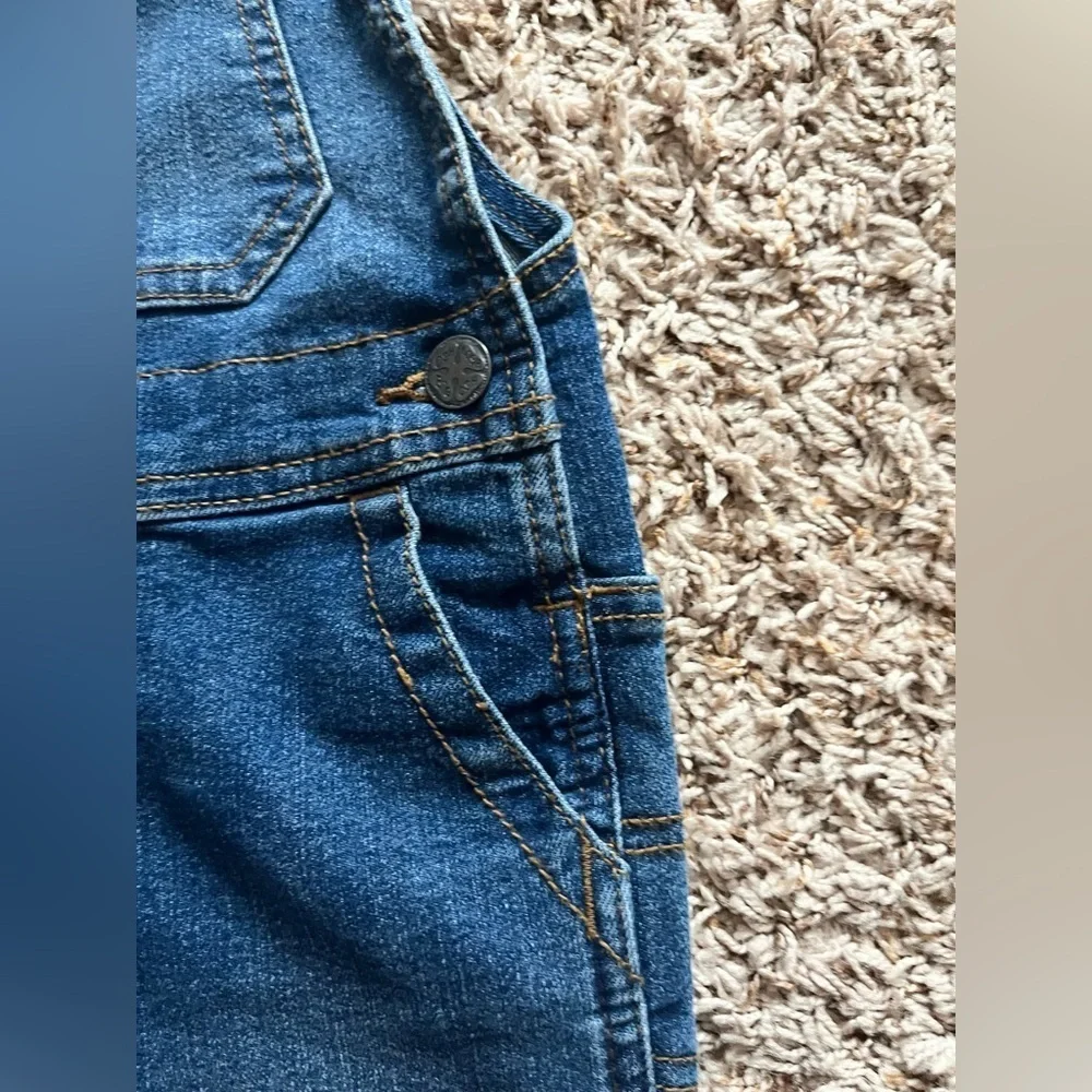 OshKosh B'gosh denim overalls